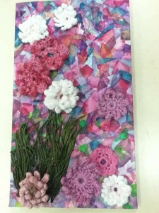 crochet flowers and mixed media wallhanging